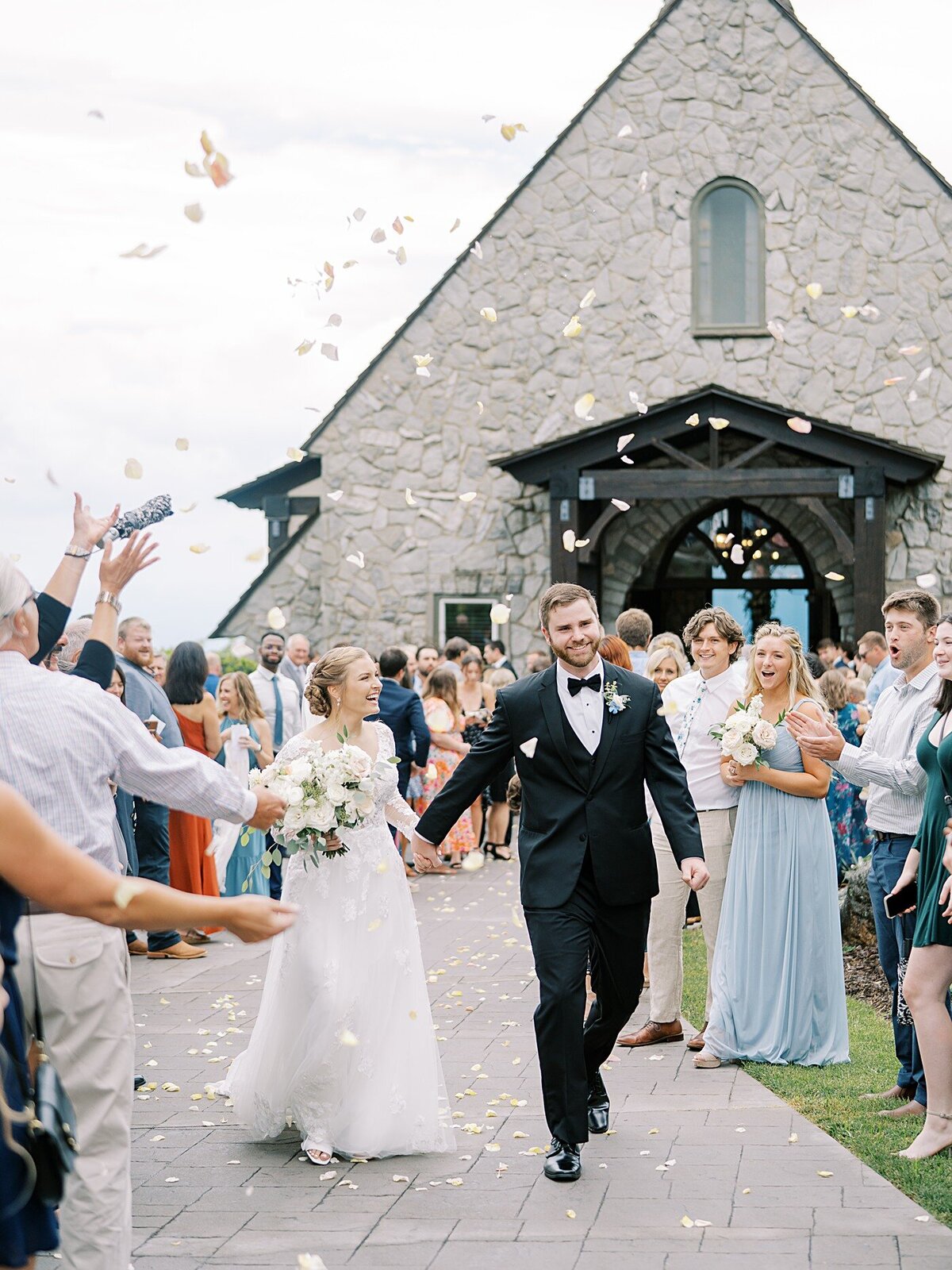 wedding-bride-groom-newlyweds-mountains-flower-petal-sendoff