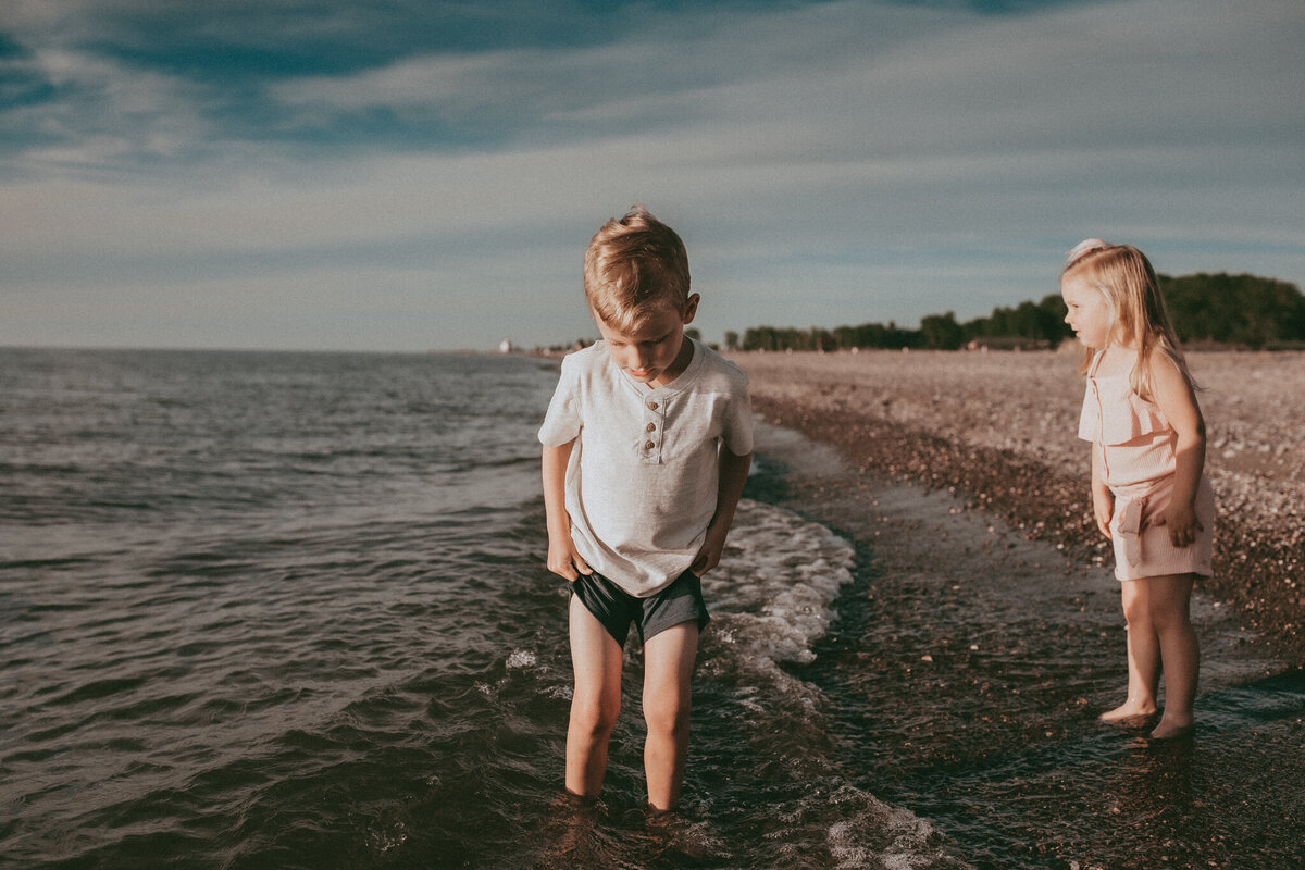 kids splashing on the lake beach