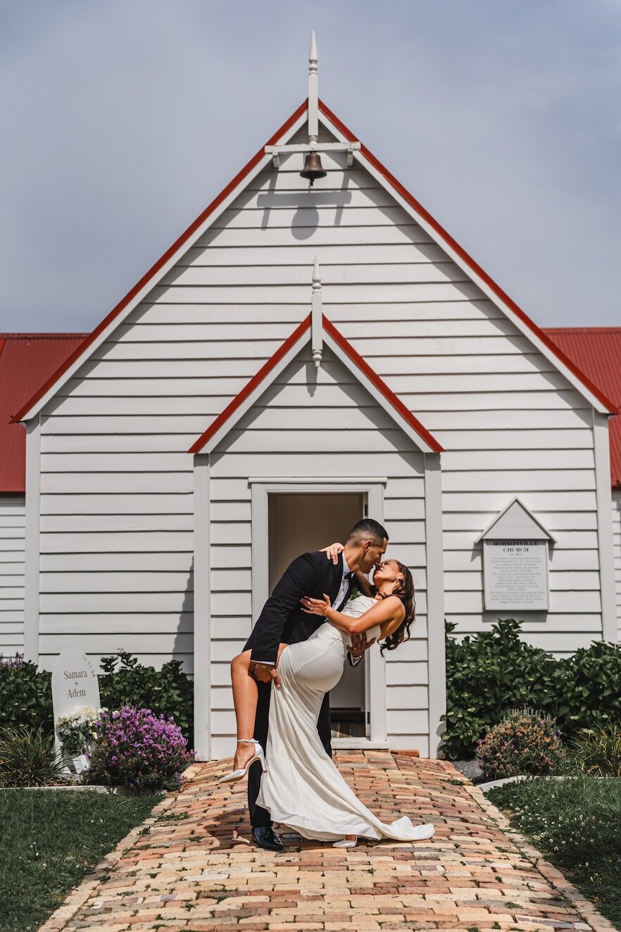 Bride and groom celebrating pop up wedding NZ