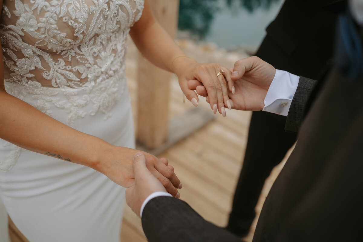 couple holding hands during ceremony
