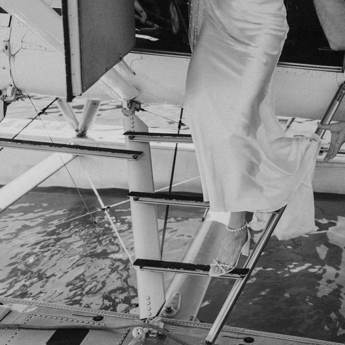 Bride stepping of a plane
