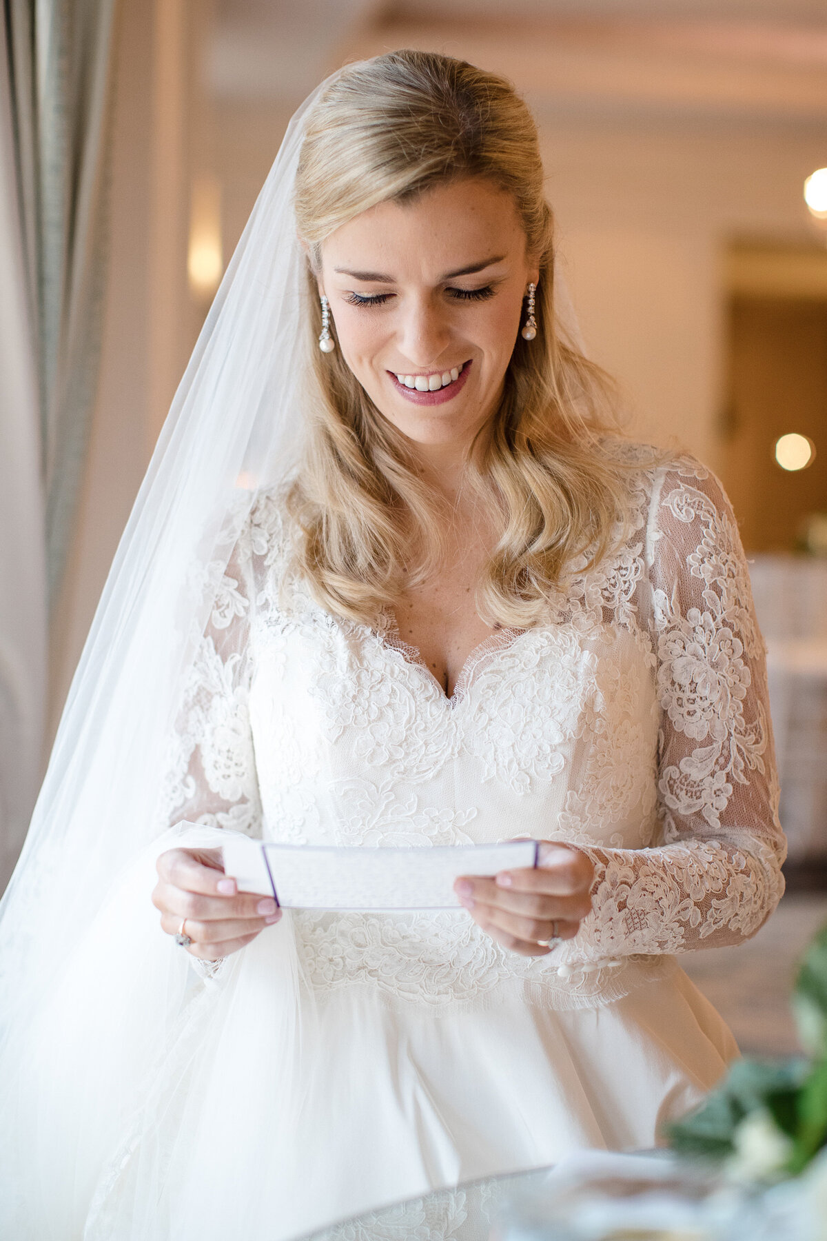 Bride Reads Letter from Groom at St Regis Atlanta