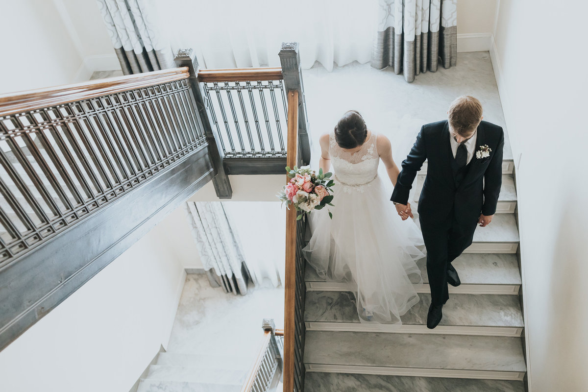 fairmont hotel macdonald wedding bride groom stairs