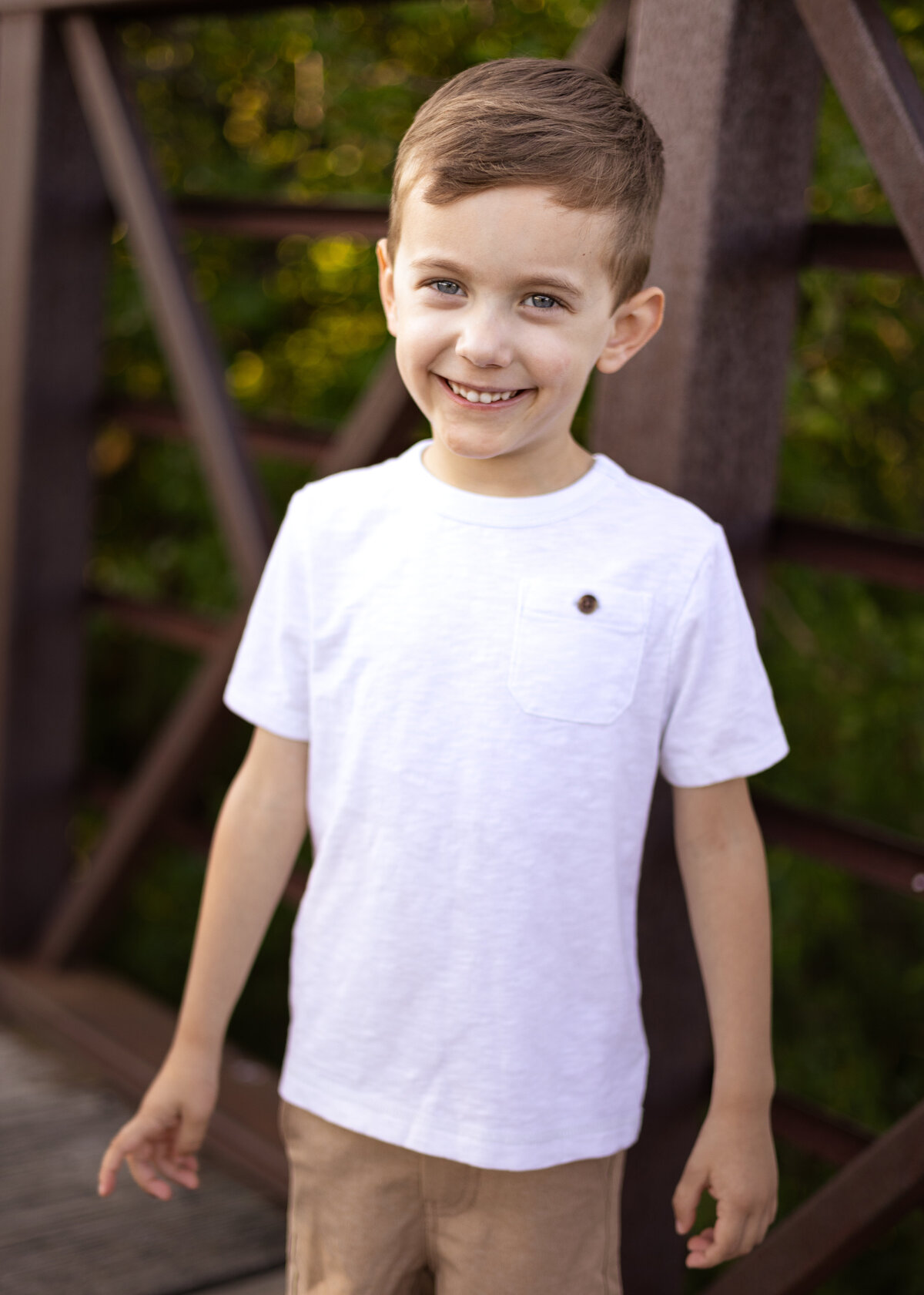 Child Posing on Bridge