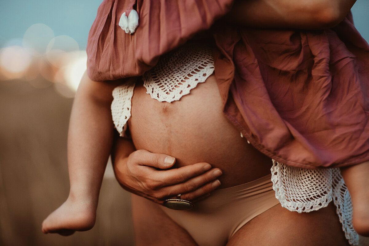 lace-white-belly-ring-pink-dress-child-hands
