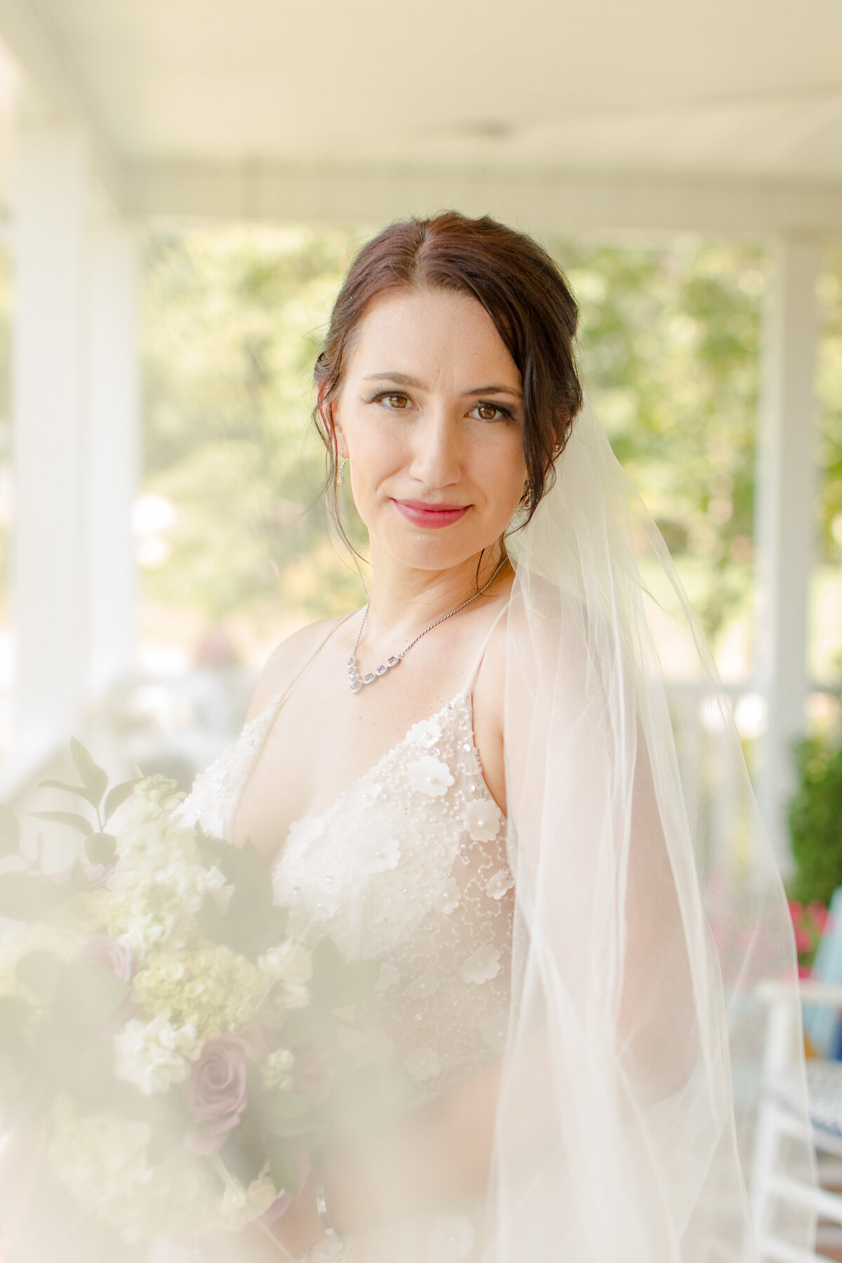bride with soft veil shot