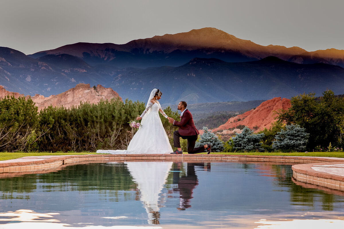 Bride and Groom Pose at the Reflection Pool Garden of the Gods