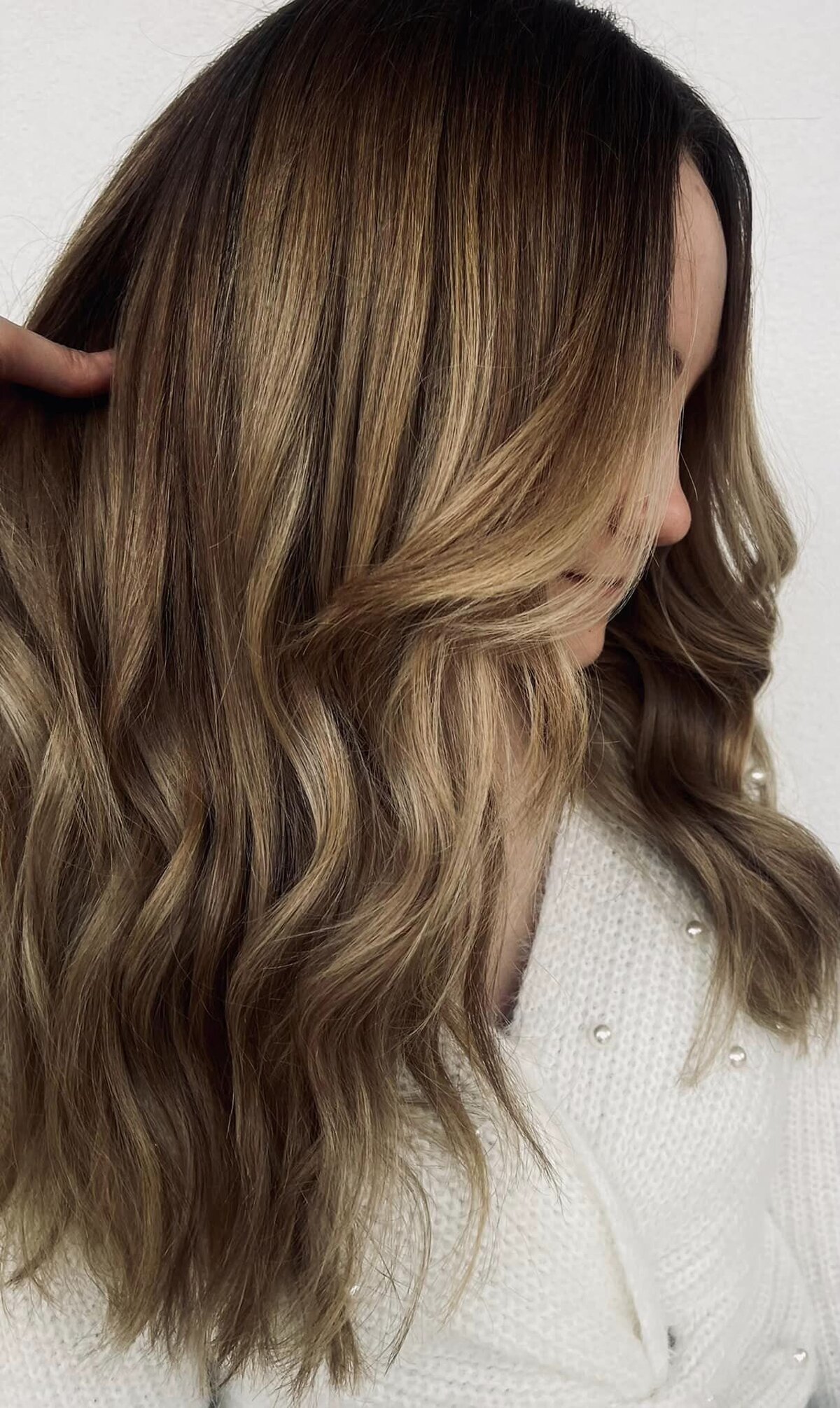 Experience the allure of brunette hair. Transform your look with rich, dimensional color and timeless elegance.