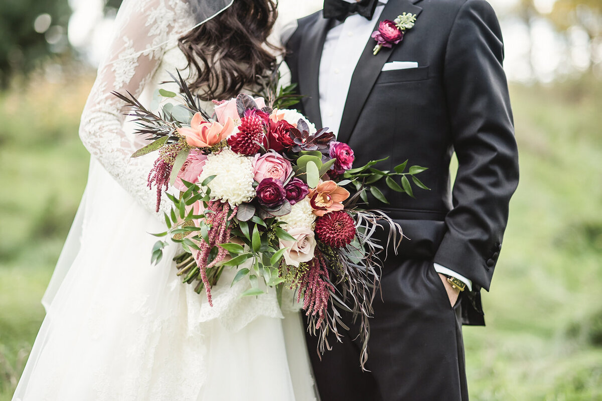 An elegant black tie garden wedding at Planterra Conservatory in West Bloomfield Michigan provided by top rated Metro Detroit wedding photographer Kari Dawson9