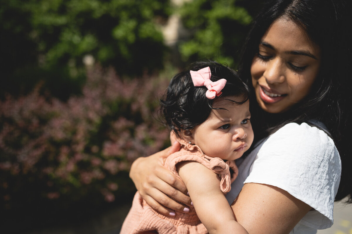 Mother and baby in a garden