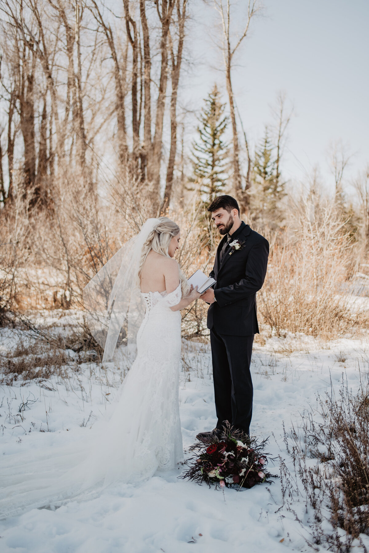 Jackson Hole Photographers capture groom watching bride and listening