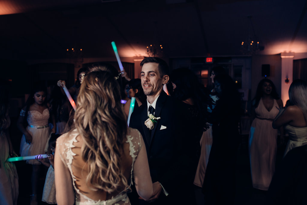 Wedding Photograph Of Bride And Groom Dancing In The Dance Floor With The Crowd Los Angeles