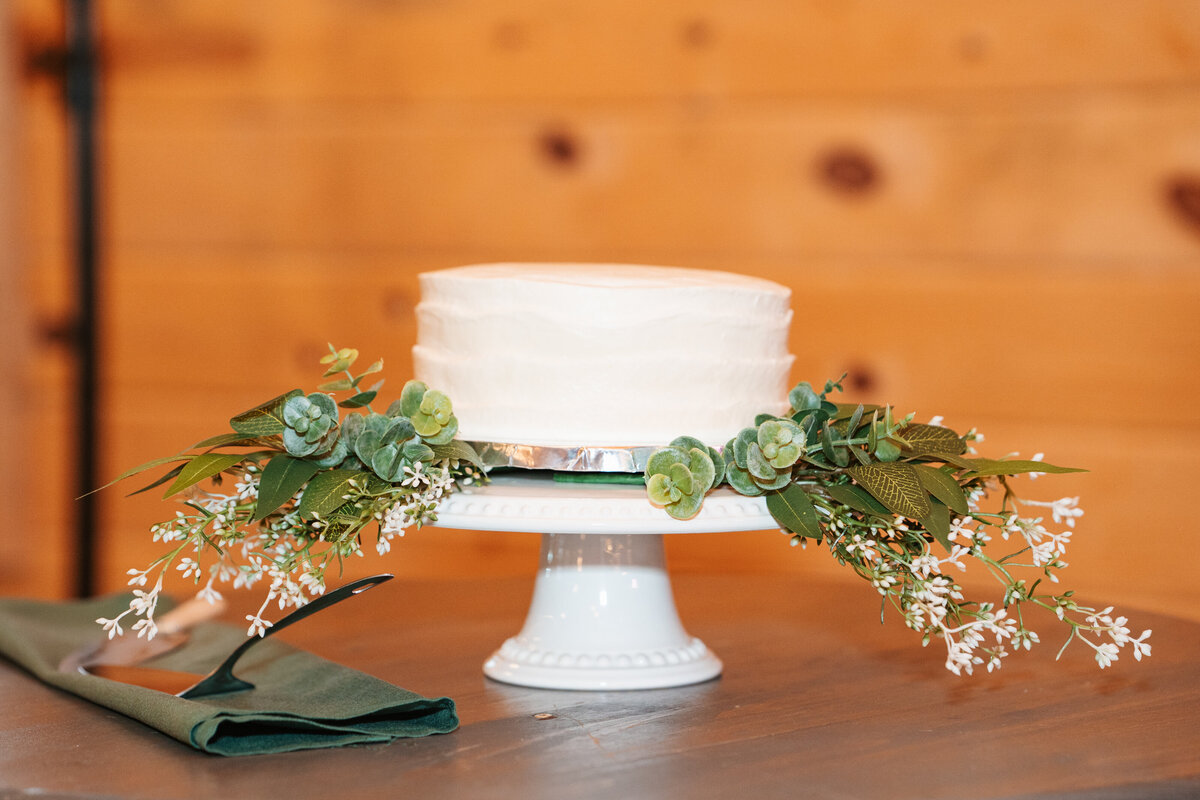Reception decor featuring rustic charm and romantic candlelight