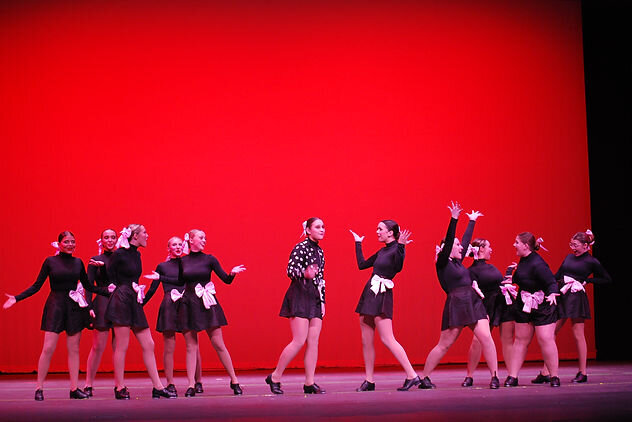 High school dancers on stage performing a tap number called 42nd Street