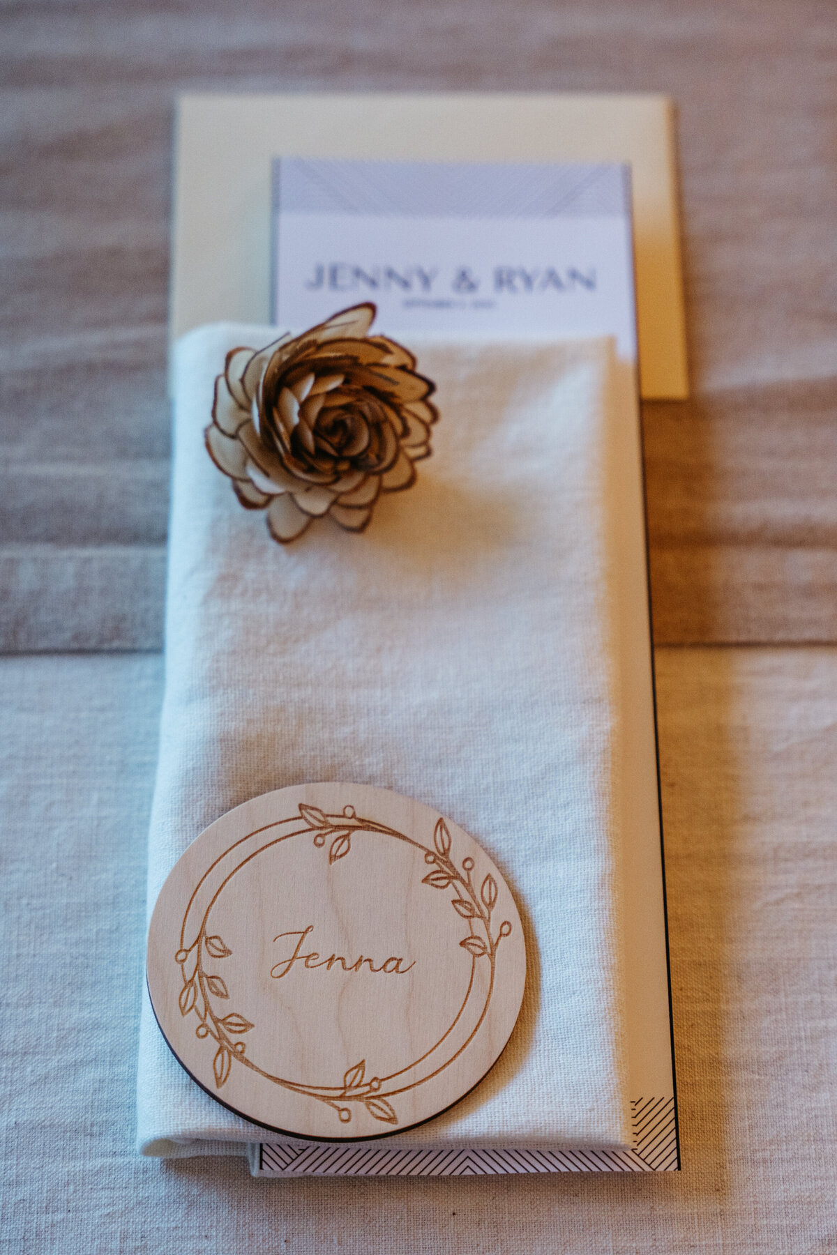 Wedding place setting with engraved wooden name tag