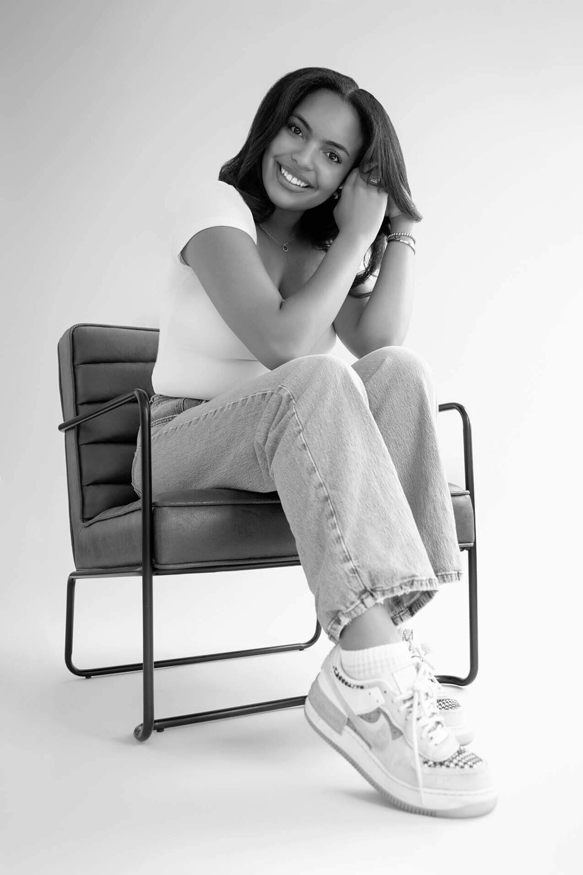 senior-girl-showing-off-shoes