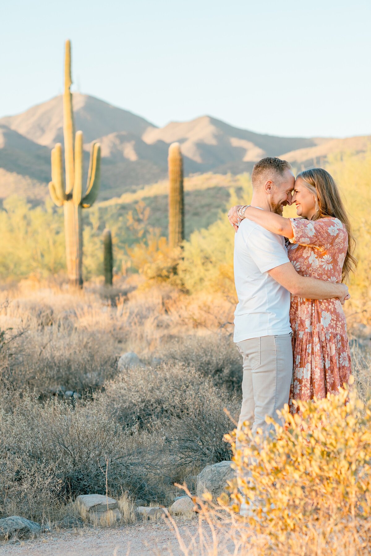 couple holding each other tight in the north scottsdale desert 