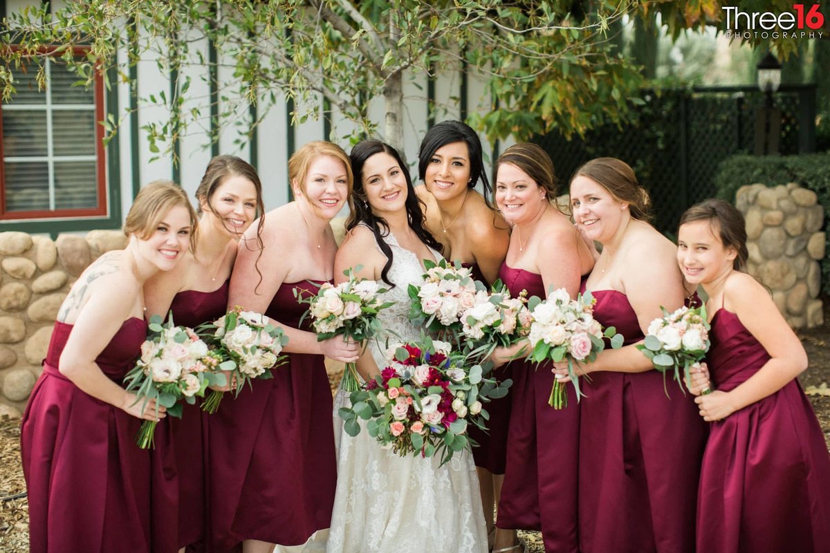 Brides and her party posing for the photographer