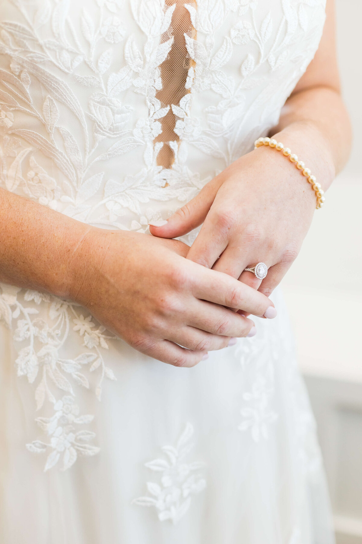 Brides hands with engagement ring at  The Barn at White Oaks, Murray, Kentucky