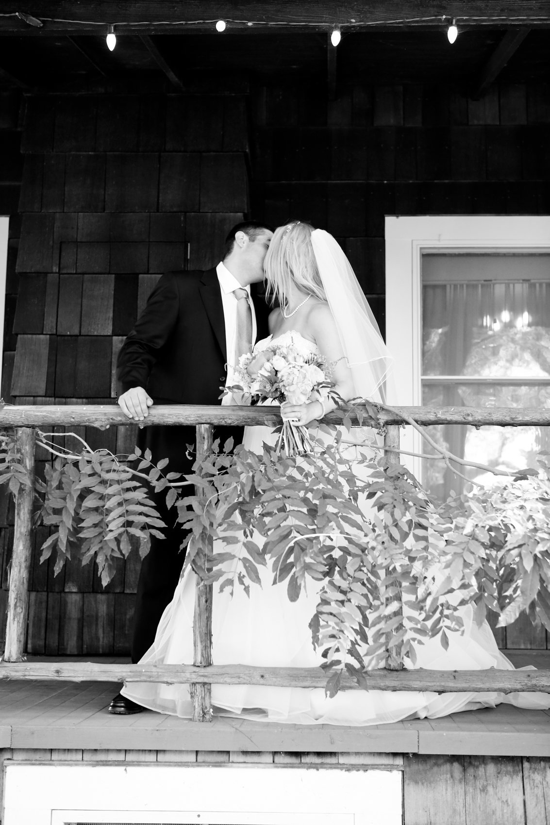 Wedding photography black and white woodsy setting greenery and rustic elements