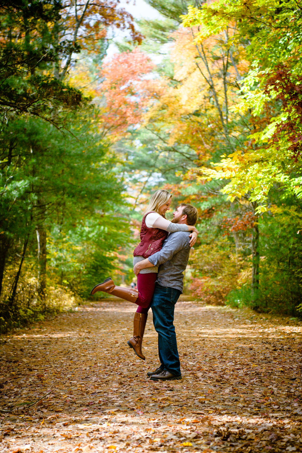 Easton MA couple hugging in woods