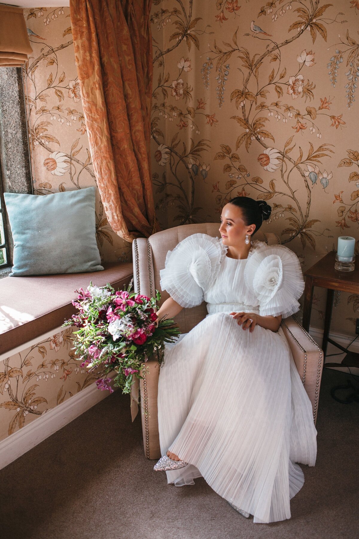 Bridal portrait in stylish elegant room at hotel 