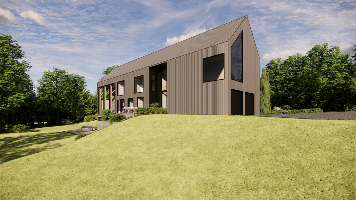 Modern house with large windows and a steeply pitched roof, set on a grassy hill. The building is surrounded by trees, and the sky is partly cloudy.