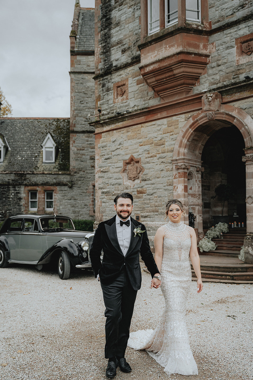 Bride and groom walking at their destination Ireland wedding