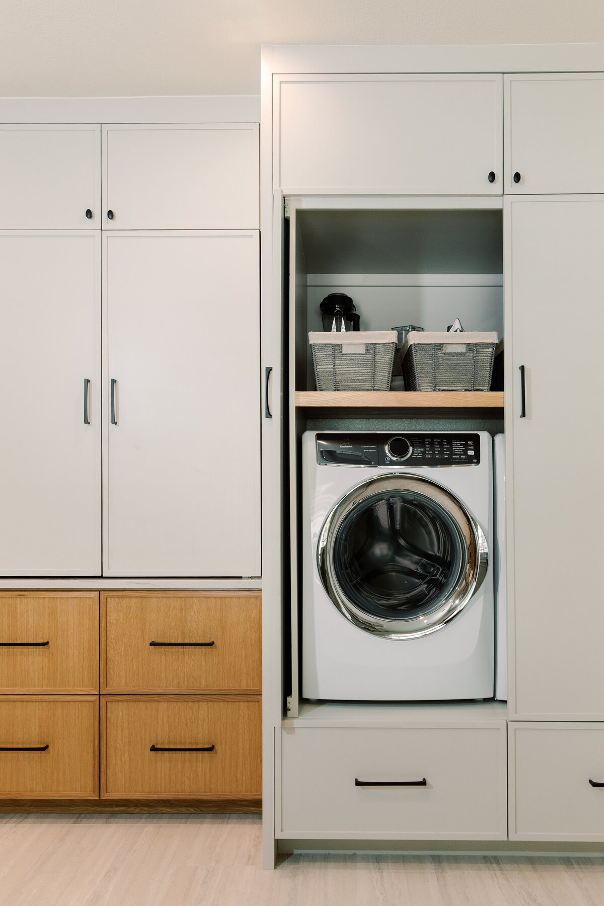 hello-home-modern-kitchen-remodel-natural-wood-cabinets-integrated-laundry-storage-austin-49
