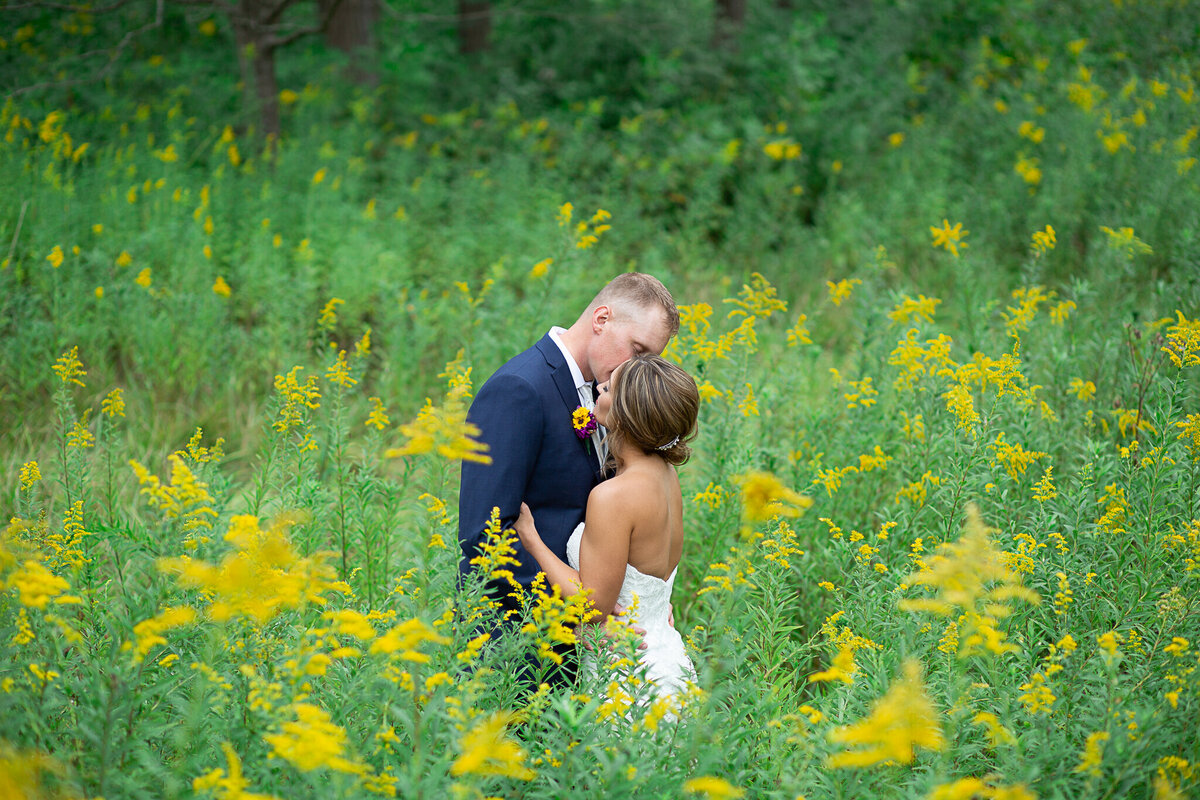 outdoor-wedding-photography-orland-park-bride-groom-field-flowers
