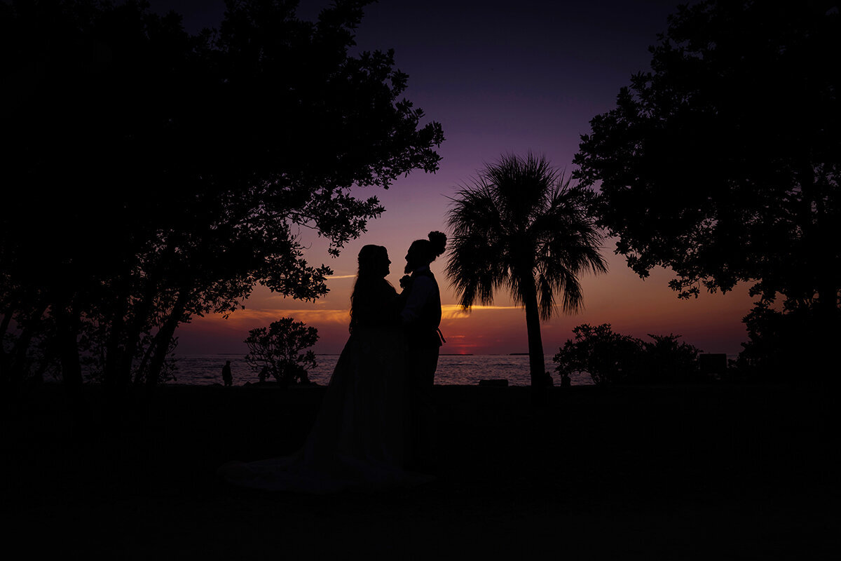 Sunset beach wedding photographers