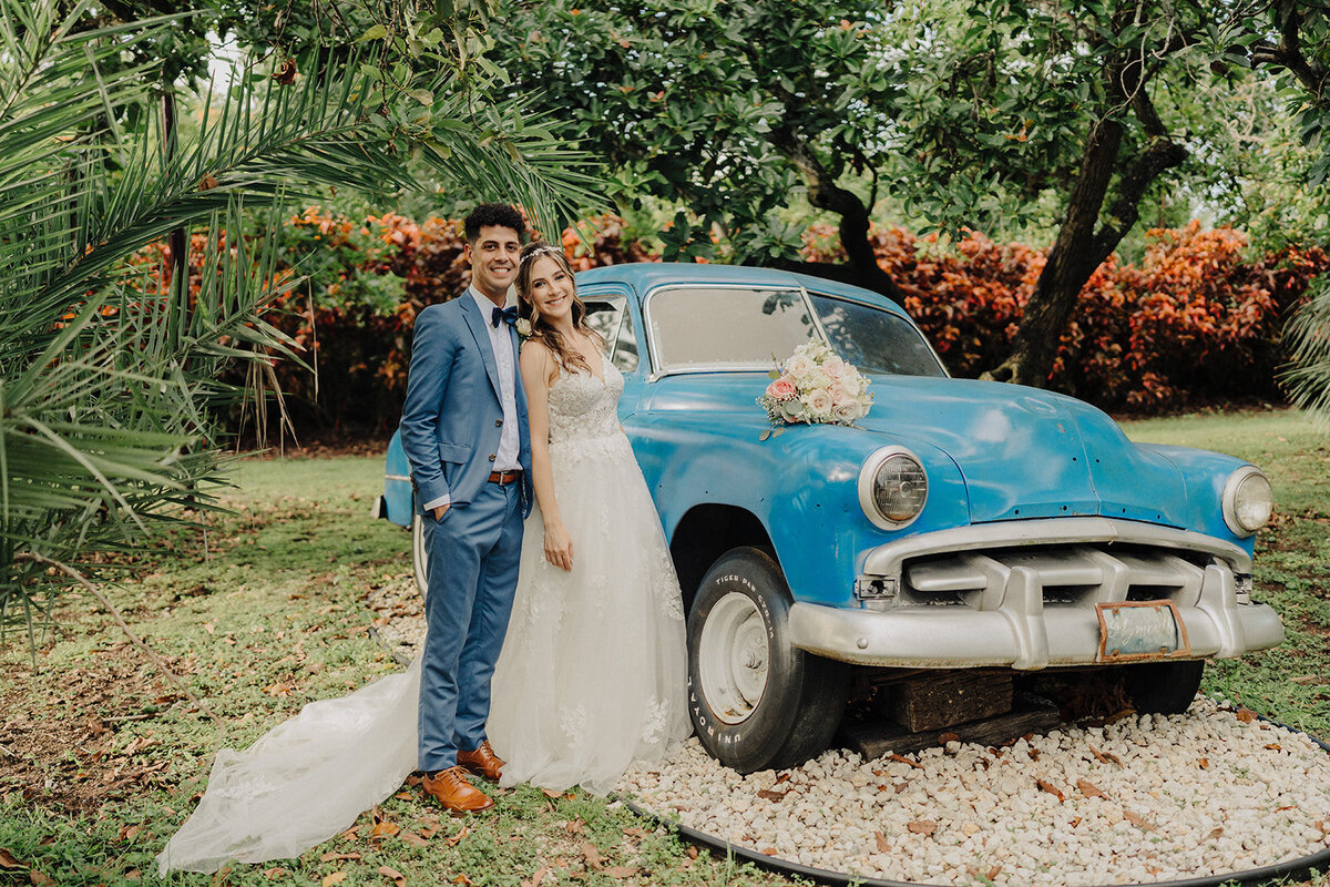 florida beach wedding bride and groom vintage car
