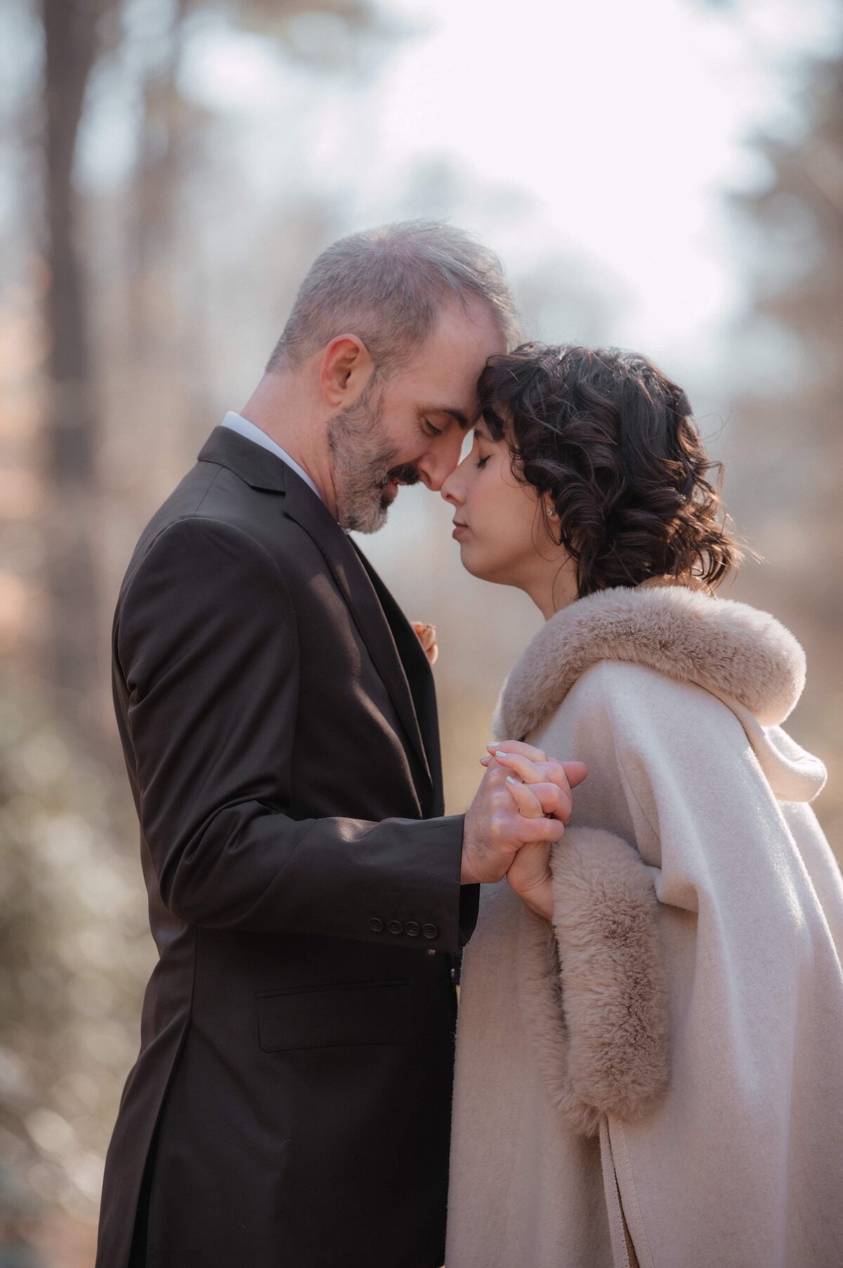 Romantic forest elopement portrait edited with First Light preset – soft golden tones, gentle highlights, and a warm, nostalgic glow.
