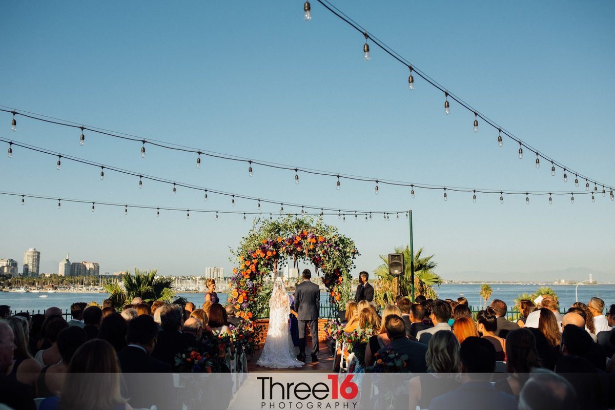 Beautiful wedding ceremony overlooking the ocean in Long Beach, CA