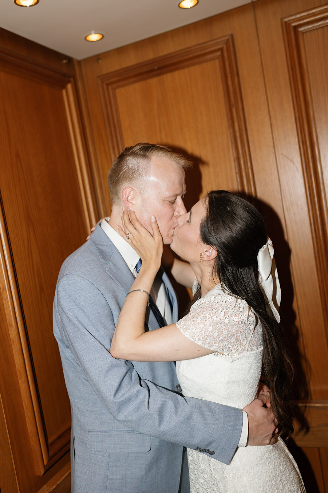 Just married couple posing for a portrait at Fort Worth courthouse.