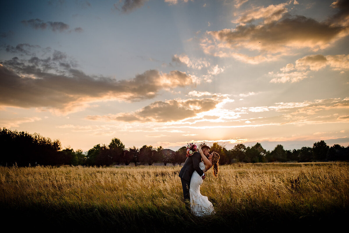 Bride and groom with a Colorado sunset at the Lionsgate Event Center.