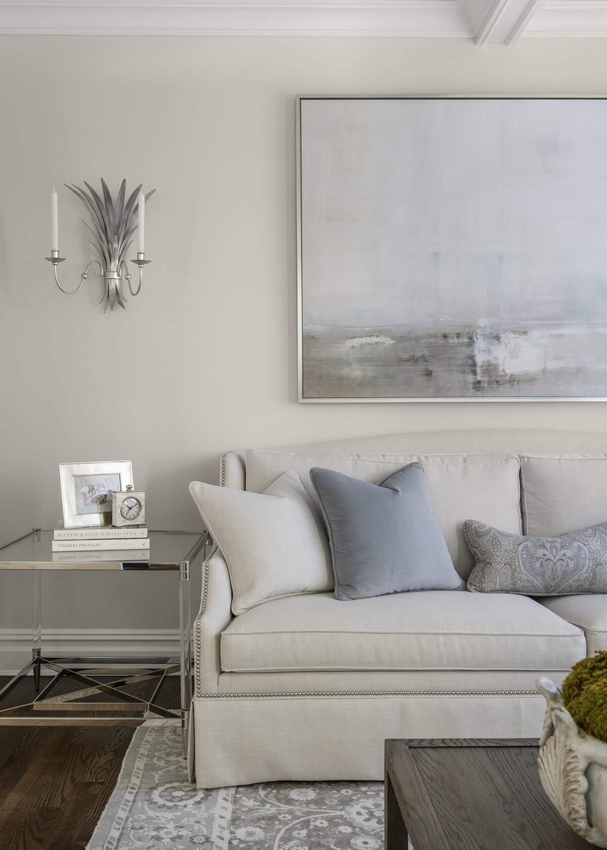 candra lynn interiors ocean port project living room with white sofa and blue accent pillows