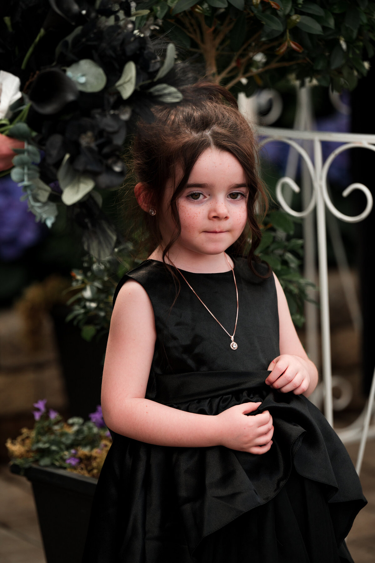 flower girl at her parents wedding ceremony