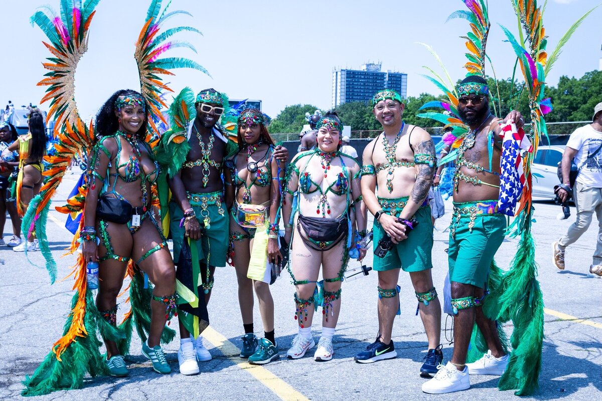 Toronto caribbean carnival parade masquerader in costume with Sunlime Mas, the number 1 medium size band at Toronto Carnival.