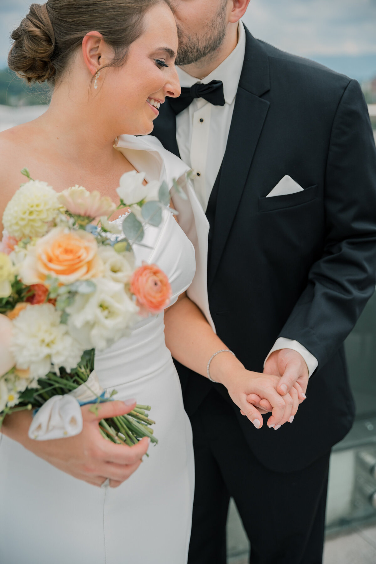 Editorial image of a bride and groom on the rooftop of the Bristol Hotel before their Bristol Train Station wedding
