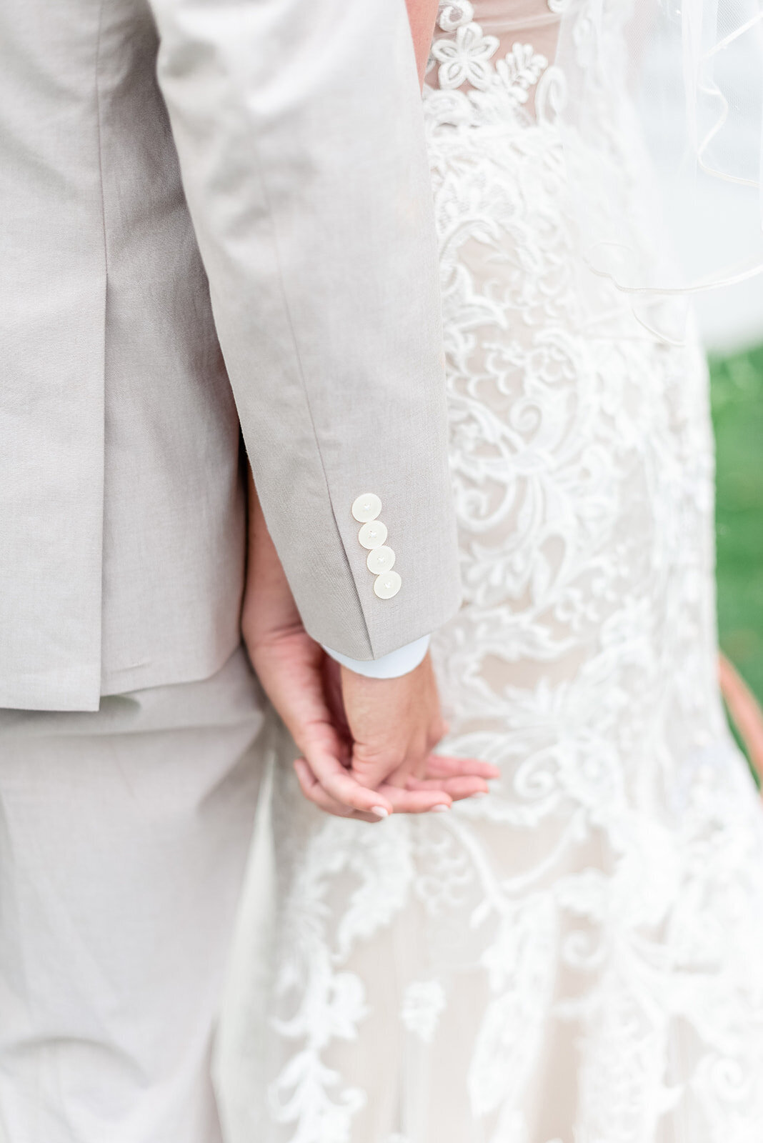 Bride and groom holding hands, xLight and airy wedding photography by the Best Boise Wedding Photographers