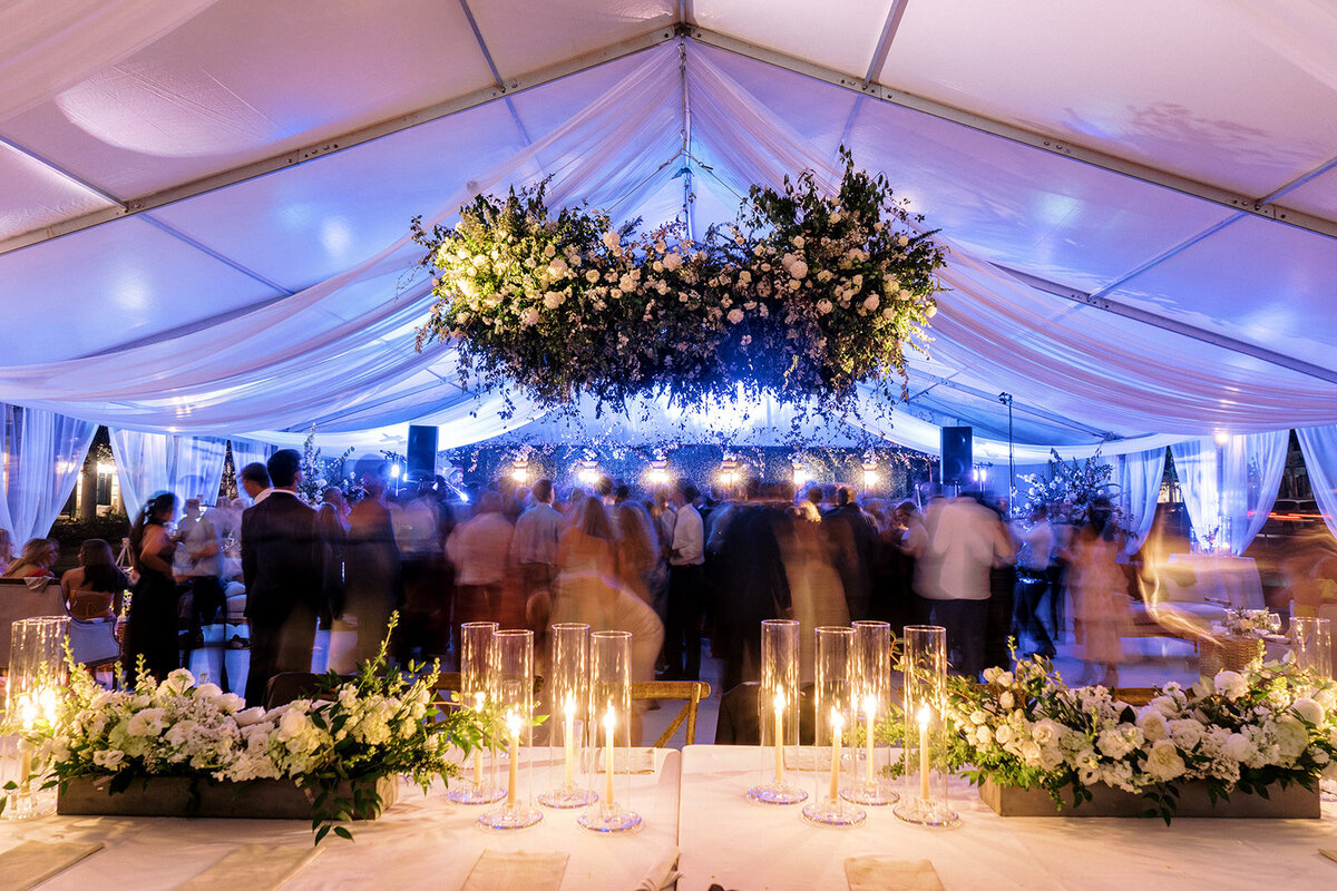 destination-tented-wedding-handing-floral-reception