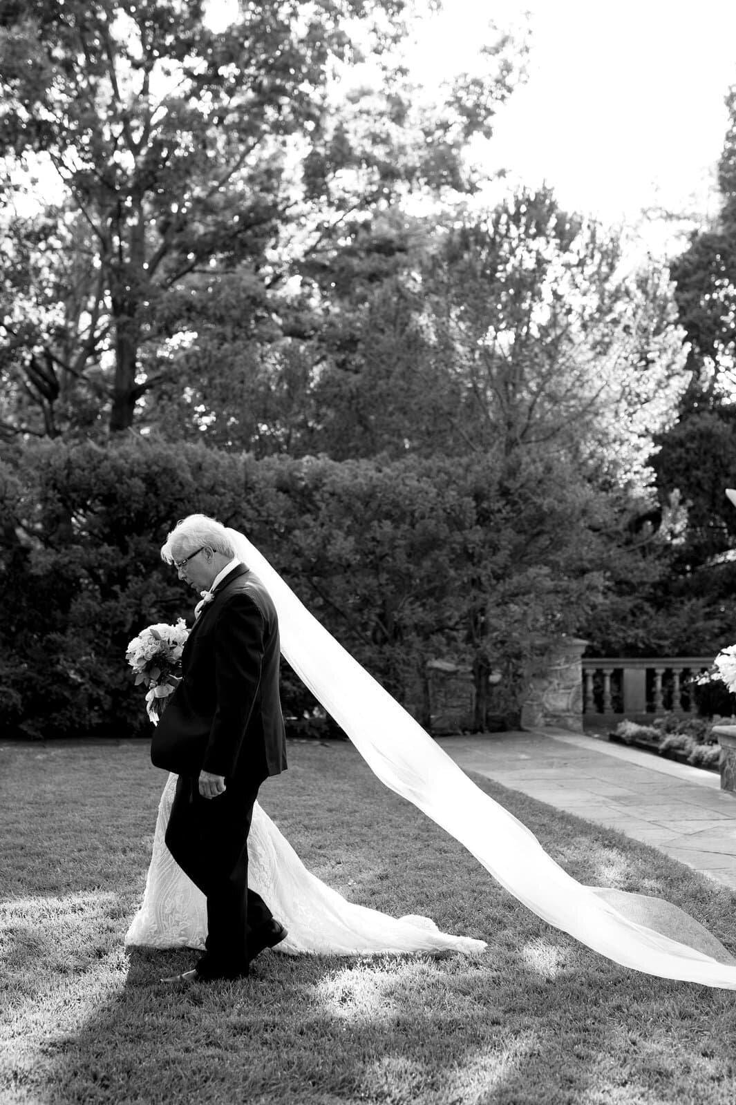 Father Walks with Bride Dramatic Entrance Ceremony at Graydon Hall Manor Toronto Wedding Venue Jacqueline James Photography