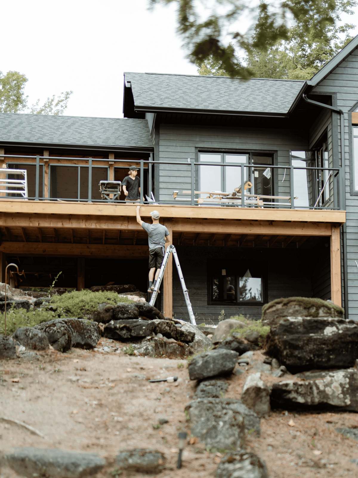 Elegant timber frame cottage build in Haliburton Highlands, combining traditional design with high-end craftsmanship.