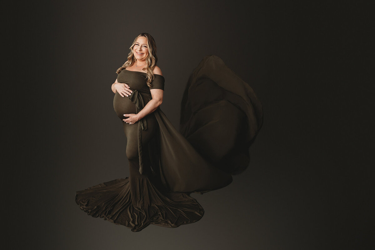 Expectant mother poses for Maternity Portraits in Charleston, SC Maternity Photography Studio. 