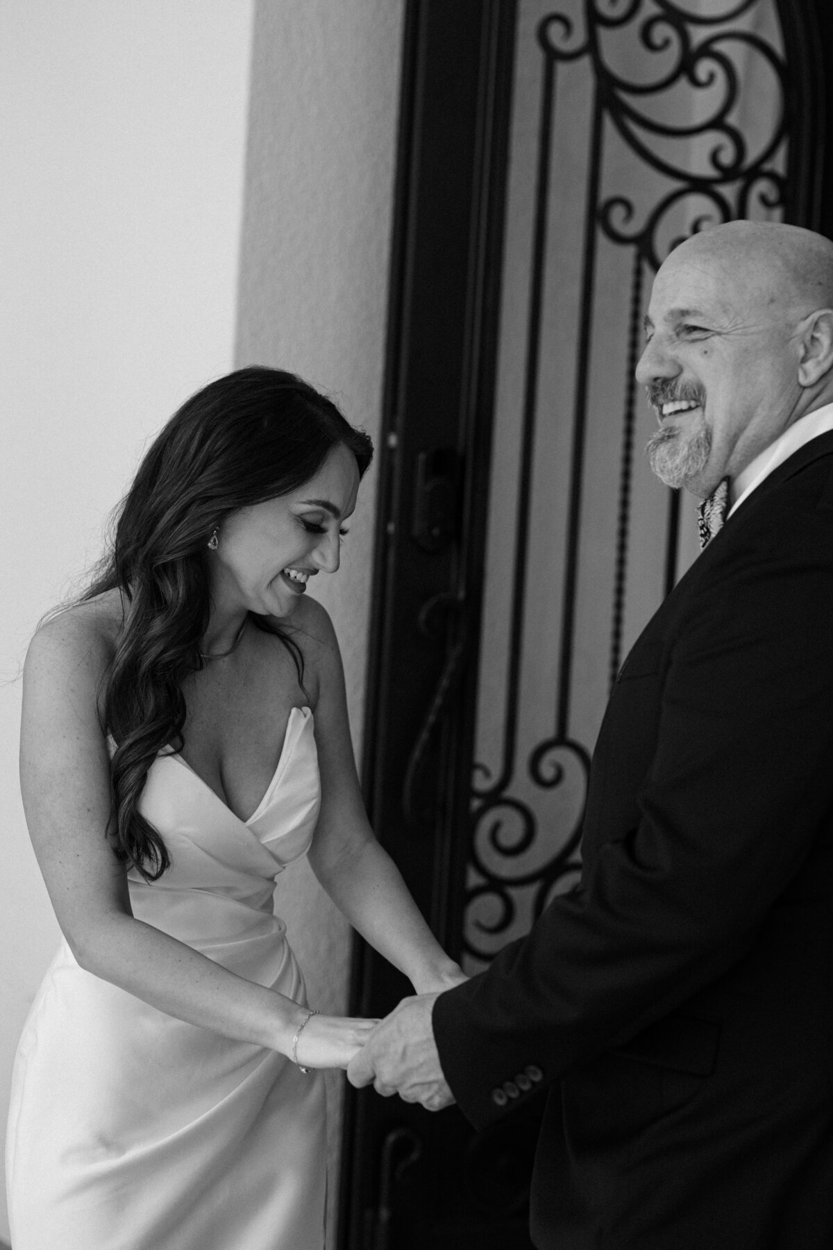 Emotional first look moment between bride and dad at La Casa Toscana