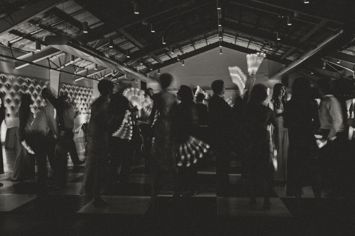 dance-floor-glowsticks-black-white-blur