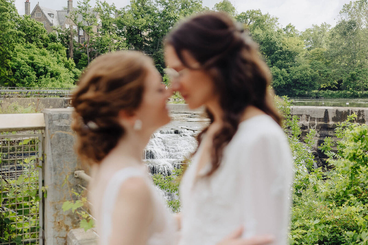 Brides touching noses at Cornell University