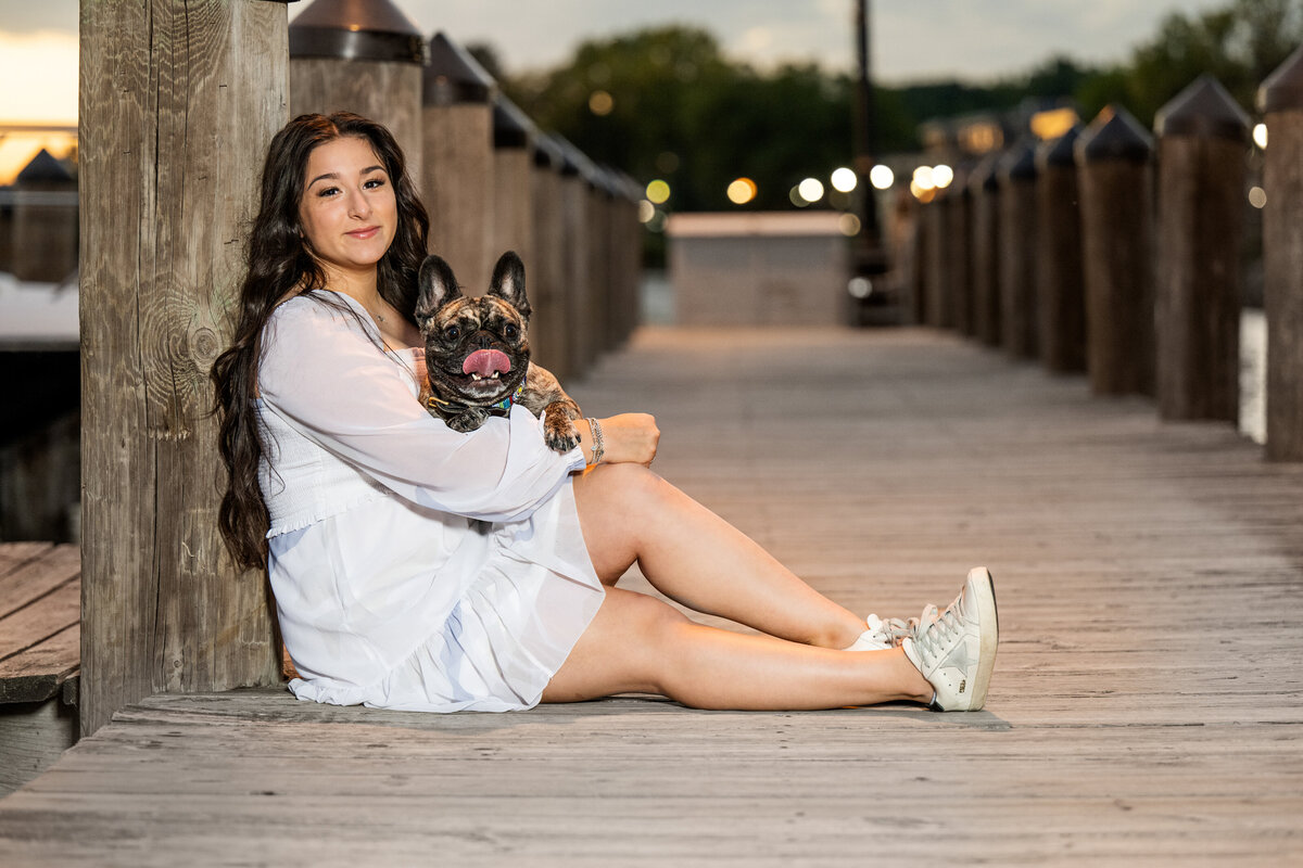 Medina Minnesota high school senior  photo of girl in white dress with dog on the dock