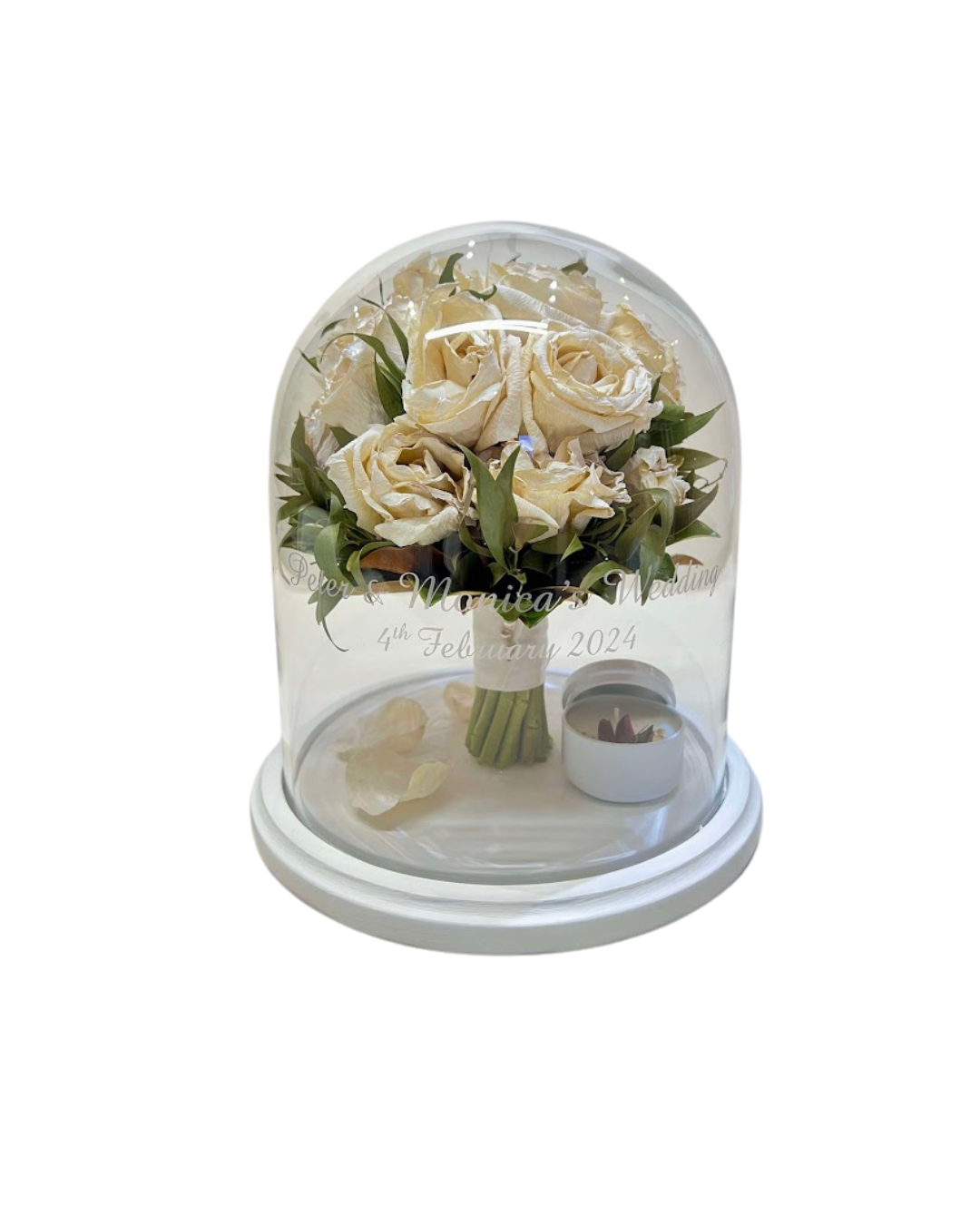wedding bouquet preserved inside a dome.